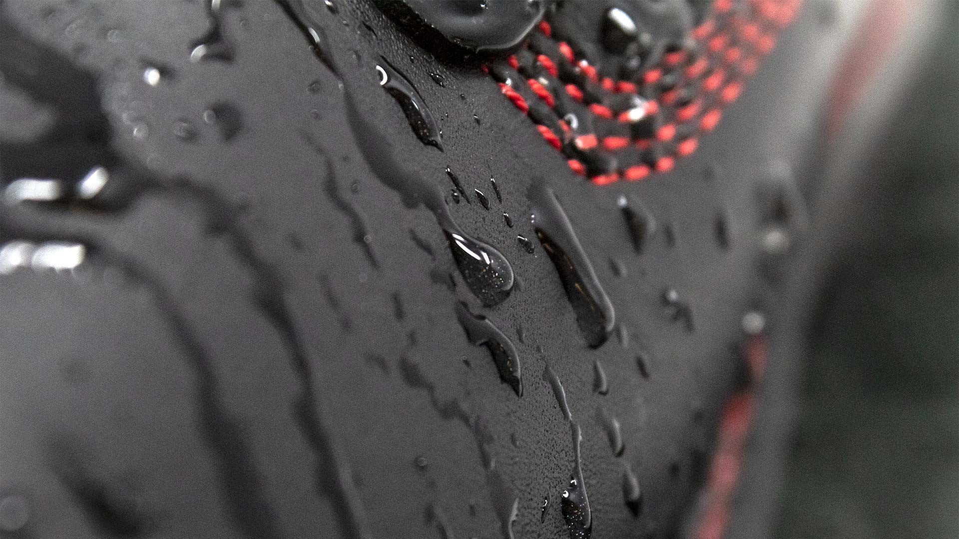 zoom in on revolt boot with water droplets