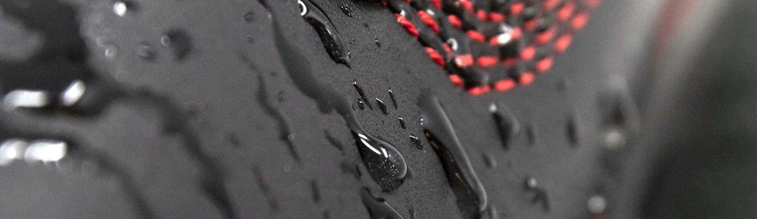 zoom in on revolt boot with water droplets